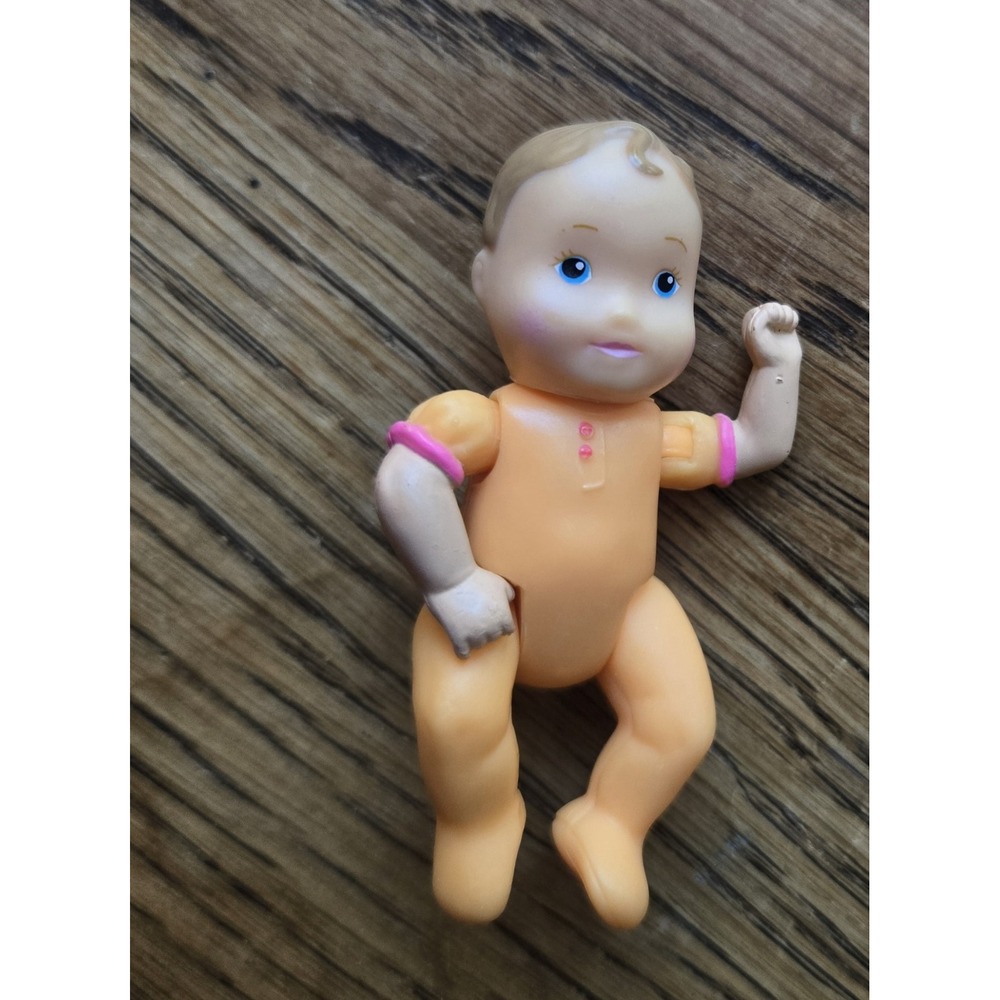 Fisher-Price Loving Family Dollhouse Girl Baby Doll Figure in Orange Sleeper